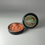 Earth Nectar Co. Top Pocket Gummies in Mango, open tin of THC mini gummies beside the sealed tin