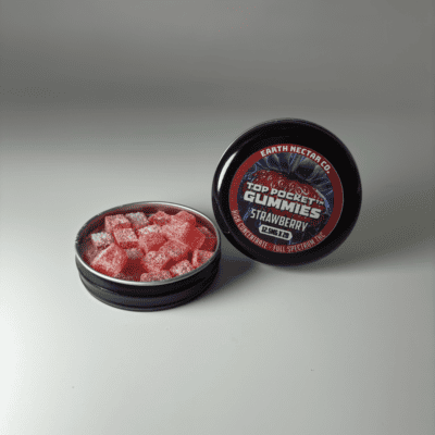 Earth Nectar Co. Top Pocket Gummies in Strawberry, open tin of THC mini gummies beside the sealed tin