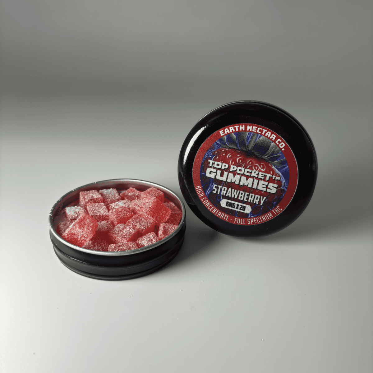 Earth Nectar Co. Top Pocket Gummies in Strawberry, THC mini gummies in an open pocket tin