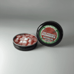 Earth Nectar Co. Top Pocket Gummies in Watermelon, open tin of THC mini gummies beside the sealed tin