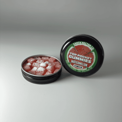 Earth Nectar Co. Top Pocket Gummies in Watermelon, open tin of THC mini gummies beside the sealed tin